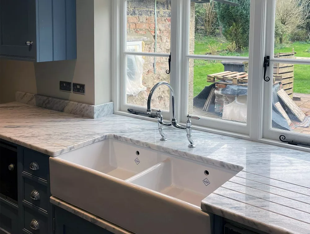 Bespoke quartz, marble and granite surfaces for kitchens, bathrooms and living spaces